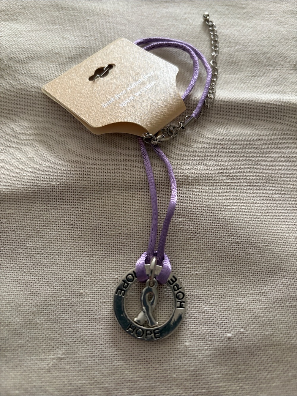 Purple Cord Necklace with Silver-Tone Medallion Pendant